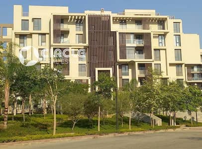 Modern 160 sqm apartment fully finished with kitchen units and ACs for rent in Eastown (SODIC) – New Cairo.