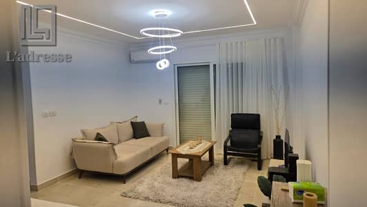  فرصة للسكن الراقي! شقة بفرش وأجهزة جديدة كلياً للإيجار السنوي في مدينتي B12 
