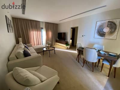 شقه فندقيه استلام فوري متشطبه بالتكييفات بالعاصمه الاداريه في الحي السكني السابع (R7) تحديدا