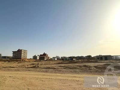 قطعة ارض ناصية على فاصلين مميزة جدا بيت الوطن التجمع الخامس الحى السادس