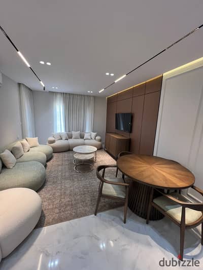 Furnished apartment for rent in Al-Rehab, first residence, modern furnishings, complete special finishes, 3 bedrooms, long and short-term periods, American kitchen, complete air conditioning, complete appliances
