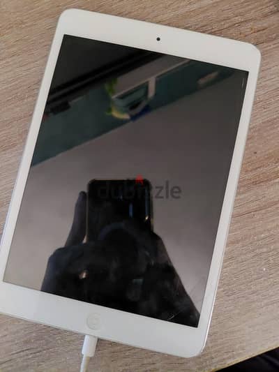 iPad mini 1 16 gb work perfectly there is scratches on screen