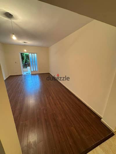 3-bedroom apartment on the ground floor with a garden in first-use condition for sale in Al-Rehab