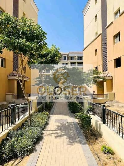 Own a two-bedroom apartment for sale, ready for occupancy in one year, near Madinaty, with installments over 12 years.