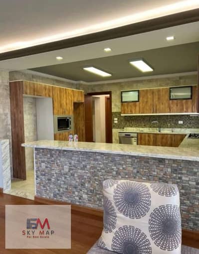 Apartment for sale in Madinaty, 131 square meters, ground floor with a 50 square meter private garden overlooking a large wide garden, special finishe