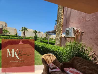 Ground floor chalet with a 120 sqm garden for sale in Blumar North Coast, Sidi Abdelrahman. Immediate occupancy.