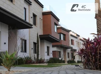 townhouse villa for sale  4 bedrooms delivery 2026 prime location open view in compound azzar2 new cairo