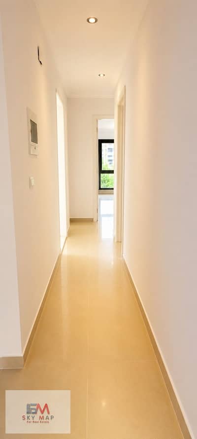 Apartment for sale in Madinaty, 325 meters, model 700, company finishing, third floor, villa view and wide garden.