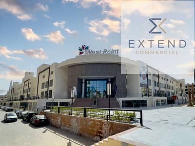 Administrative office for rent inside a shopping mall in front of the University of Culture and Science and on the central axis in 6th of October City with a distinguished location