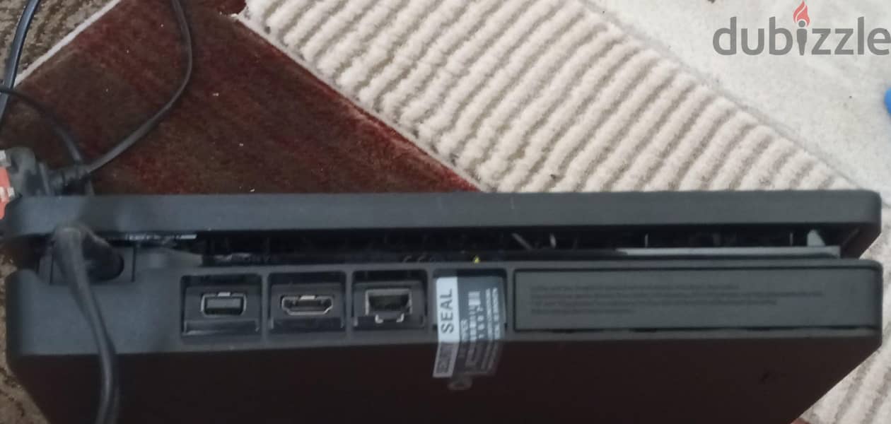 PS4 Slim 500 GB + 2 Controllers + 3 Games (Cds) 1