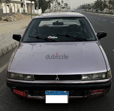 ميتسوبيشي لانسر 1990 عيون صفية فابريكا دواخل