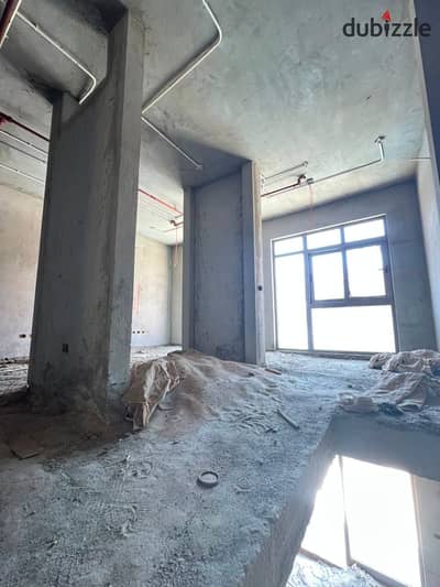 Full Administrative Building for Sale in The Courtyard, Sheikh Zayed  | Private Storage & 2 Parking Spaces
