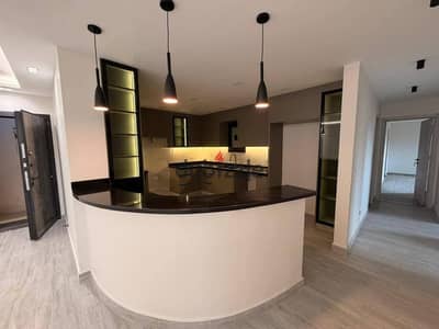 Apartment for rent with kitchen in The Square Compound; features ultra-super-lux finishing and a view of the landscaping.