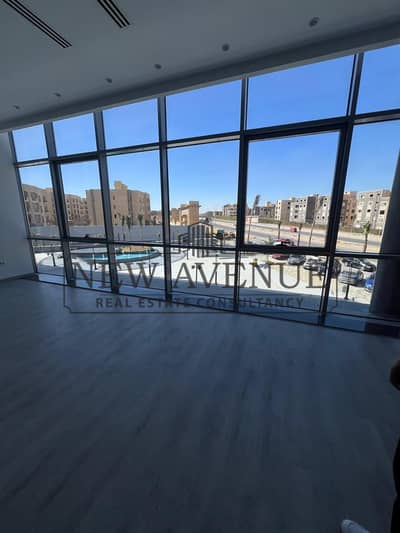 Delivered fully finished Office with open view  for rent in the Ledge New Cairo with Very Prime location