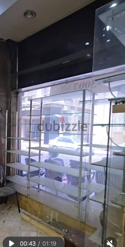 ارفف سكوريت خشب زان بتارين زجاج سكوريت مكتب خشب بترينه بترينة أرفف