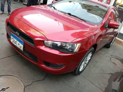 ميتسوبيشي لانسر 2017 فئة تالته خليجي فابريكة بالكامل نقداً وتقسيط