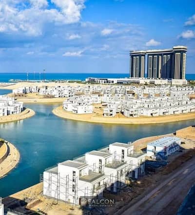 بـ أقل سعر 145 متر , الساحل الشمالي العالمين فيو كامل لـ الابراج ,واقساط Alalmien جاهز للمعاينه دابل فيو من جميع الغرف ( تصميم خيالي )