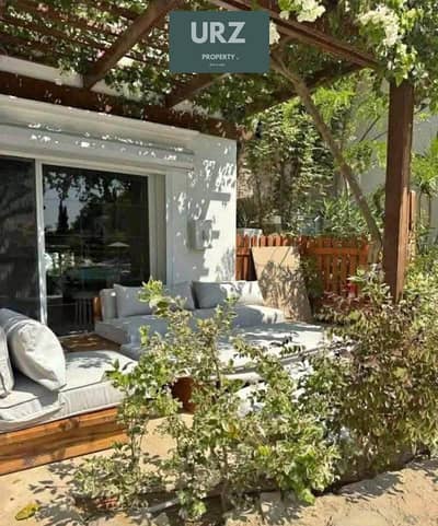 Corner townhouse with and luxurious finishing on a 15 year installment plan in a villas only phase in Talala New Cairo near Madinaty and Mivida and ne