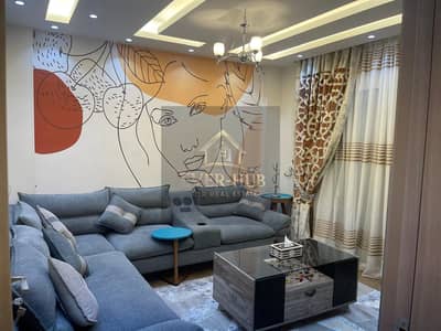 Furnished apartment for rent in Jannah Zayed 1, brand new furniture, first occupancy, second floor, landscape and sea view.