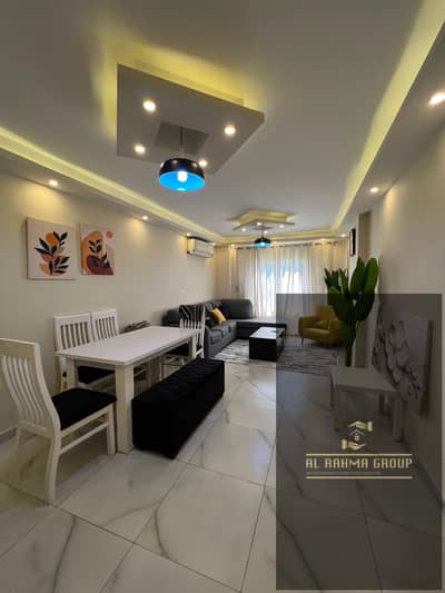 Furnished apartment for rent in El Rehab City, New Cairo, next to the old market. It consists of 3 bedrooms, 2 bathrooms, and modern furnishings.