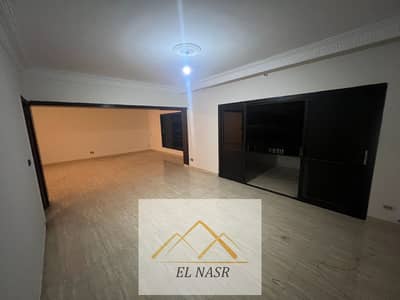 180 sqm apartment for rent in the Embassies District (Hayy Al-Sifarat), Nasr City, within the Misr for Reconstruction (Misr Lil-Ta'meer) buildings—a p