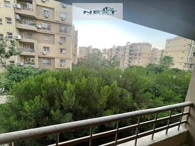 For rent in Madinaty, a new law apartment of 143 sq m in B6, finished by the company, with a wide garden view, direct sea view, very close to services
