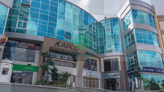 Shop for rent in kargo Mall in front of greens compound directly on the main al-shabab street