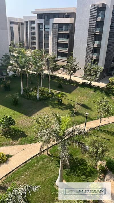 Freehold apartment for sale in Madinaty; takeover of remaining installments at an attractive price. Features custom finishes and a wide garden view.