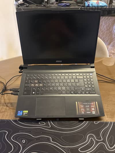 لابتوب msi مستعمل 8 شهور و لسا بالضمان و جديد rtx5050 و مساحته 512