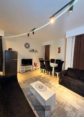 Fully furnished roof for rent in the Ninth District - Sheikh Zayed | Private terrace 70m | First housing