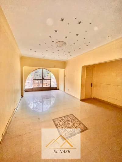 Apartment for rent on Mustafa Al-Nahhas Extension, Nasr City, near Al-Manhal, Al-Tawheed, Al-Noor school, and Total Egypt gas station.