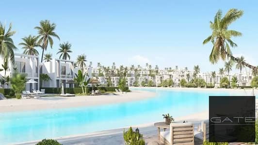 Corner twin chalet for sale at D-Bay, North Coast – direct lagoon view.