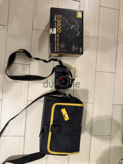 Nikon D3400 with box and bag from Shams store