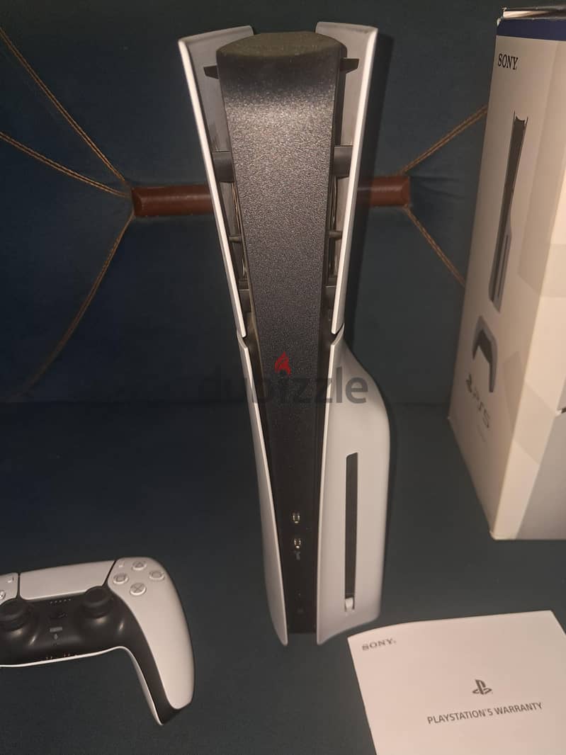PS5 Slim CD with 2 Controllers and 10 Games 2