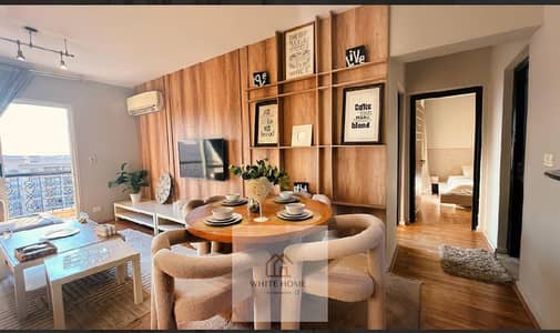 Furnished apartment for rent in Al Rehab City, 99 sq m, below market price. It consists of two bedrooms and a bathroom. Located in Phase 9, near Avenu