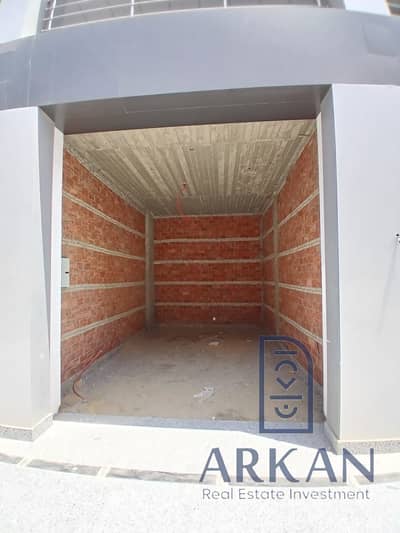 Ground-floor shop with immediate delivery and installments, in the highest population density in Hadayek October, 30 sqm with a special price TA
