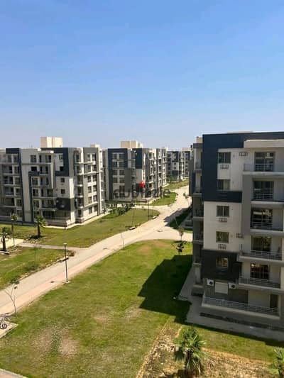For sale, an apartment of 140 square meters on the fifth floor with a landscape view in the Jannah Compound, 6 October