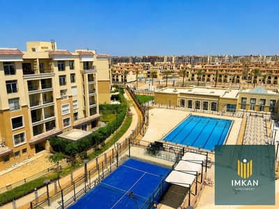 With a down payment of 490,000 for an apartment for sale with a view of landscape in Sarai Compound New Cairo next to Madinaty on the Suez Road