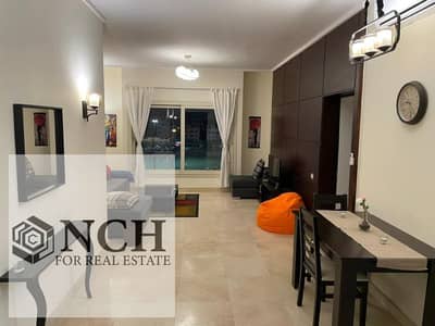 **Fully Furnished Studio for Rent in The Village – Palm Hills New Cairo**  An excellent opportunity to rent a **fully furnished studio in The Village