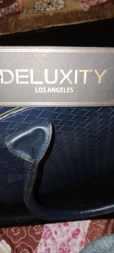 الماركة: DELUXITY - ماركة أمريكية أصلية من لوس أنجلوس
