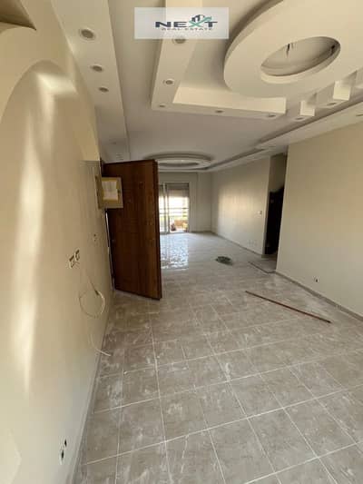 For rent in Madinaty, a new law apartment, 143 sq m in B6, with special finishing, a clear sea view of the street and garden, very close to services,