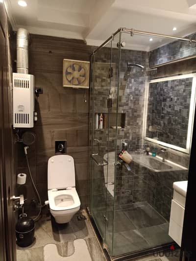Furnished hotel-style apartment for rent in Al Rehab, next to the market.