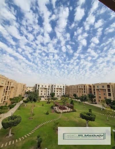 Furnished apartment for rent in Al Rehab City, New Cairo; features a wide garden view and custom finishes, located next to the Old Market.
