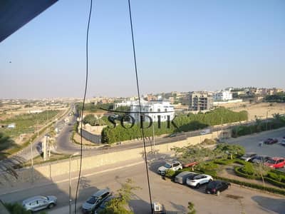 A bargain-priced apartment in Golf City compound, fully finished, double-fronted, overlooking Orabi Farms and the Golf Mosque.