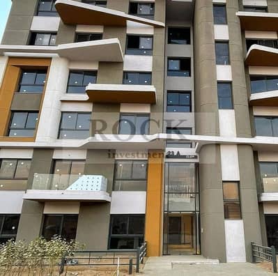 Apartment for sale with down payment and remaining installments, lagoon view in Palm Hills Compound, Fifth Settlement, New Cairo.