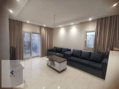 Furnished apartment for rent in Gardenia Heights 3, Fifth Settlement, steps from Hooriya Saleem Mosque, second floor, front façade, first resident, super lux finishing, modern furniture, two bedrooms and a bathroom
