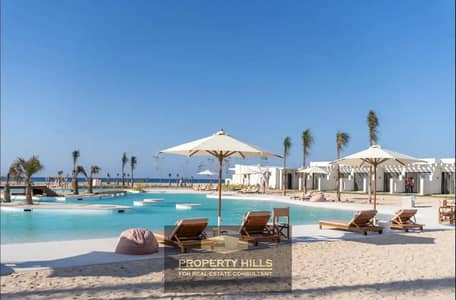 Receive your chalet on the lagoon, finished at a special price, with a sea view in De Baie, North Coast