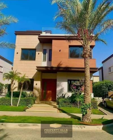 A fully finished townhouse villa with a distinctive view of the lagoon and landscaping in front of Sphinx Airport