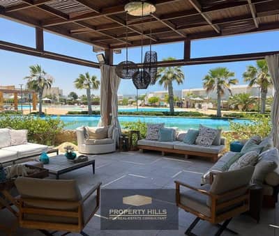 Receive your chalet immediately with a panoramic sea view, fully finished, next to La Vista and Sodic, Ras El Hekma North Coast.