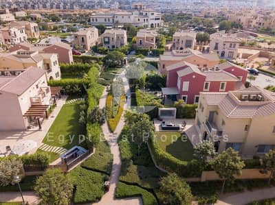 Fully finished with shatters and ACs Double view on landscape New Modern Finishing villa for sale in Mivida 5th settlement new cairo